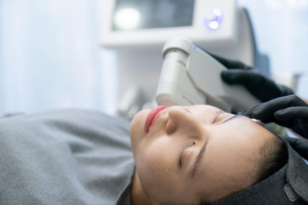 HIFU treatment on female face. High Intensity Focused ultrasound. Anti aging treatment and plastic surgery concept.